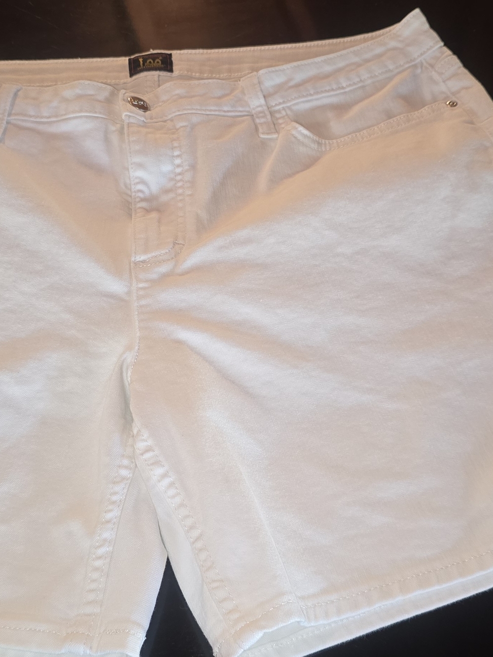 Lee women's white denim shorts, featuring a classic five-pocket design